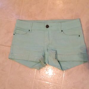 Green denim shorts